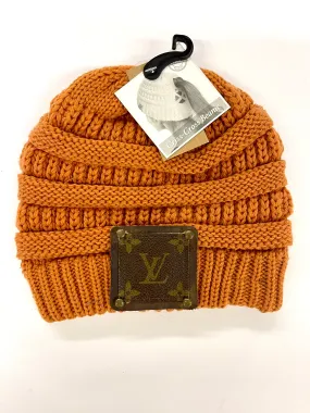 Burnt Orange Beanie (x-cross pony back) with brown patch antique hardware