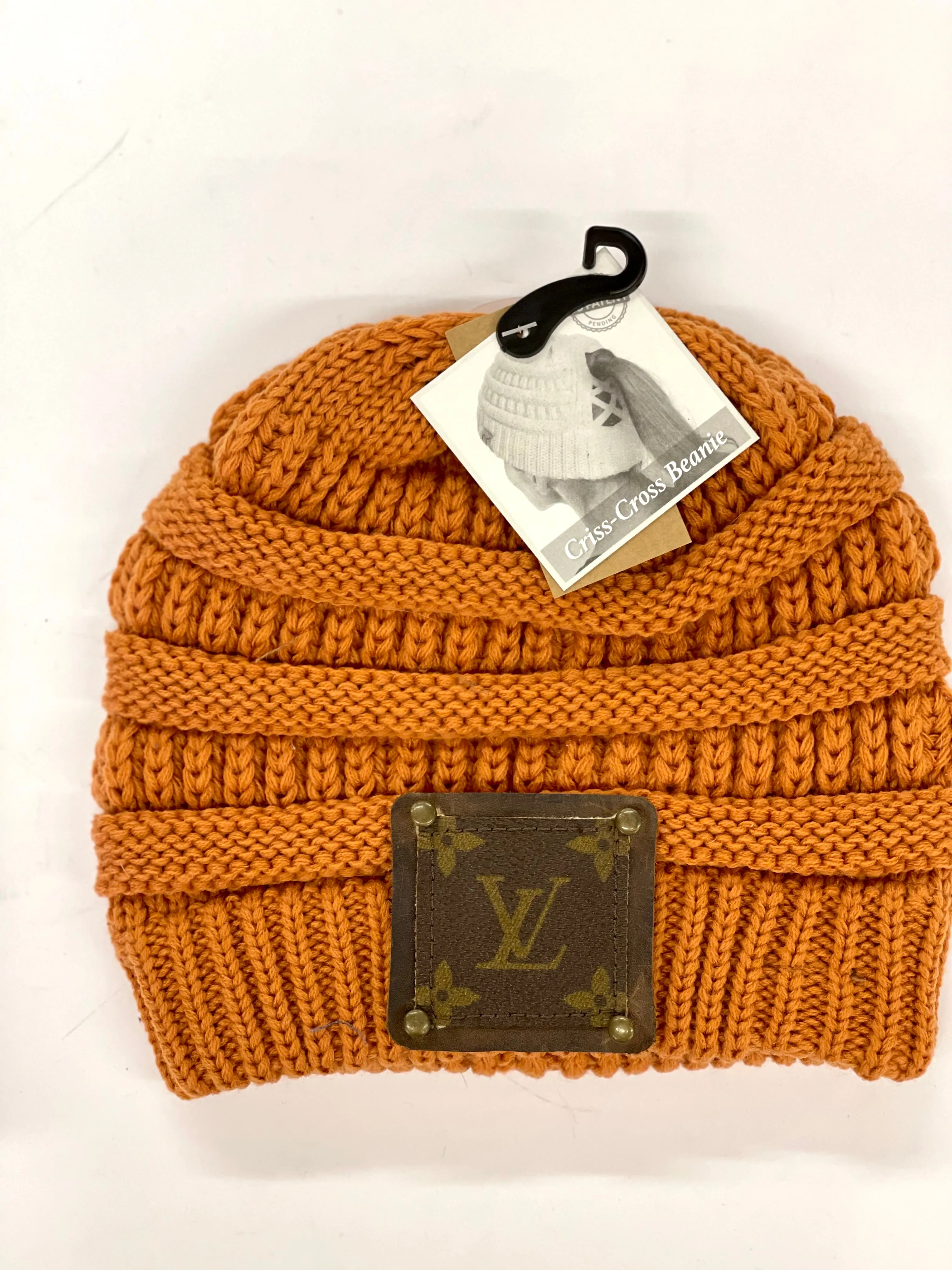 Burnt Orange Beanie (x-cross pony back) with brown patch antique hardware